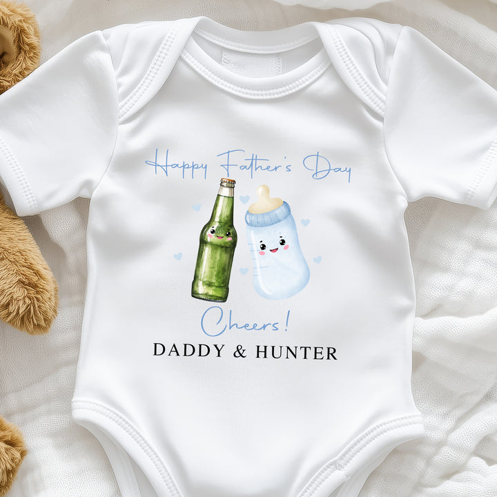 Happy First Father’s Day baby onesie featuring beer bottle and baby bottle graphic