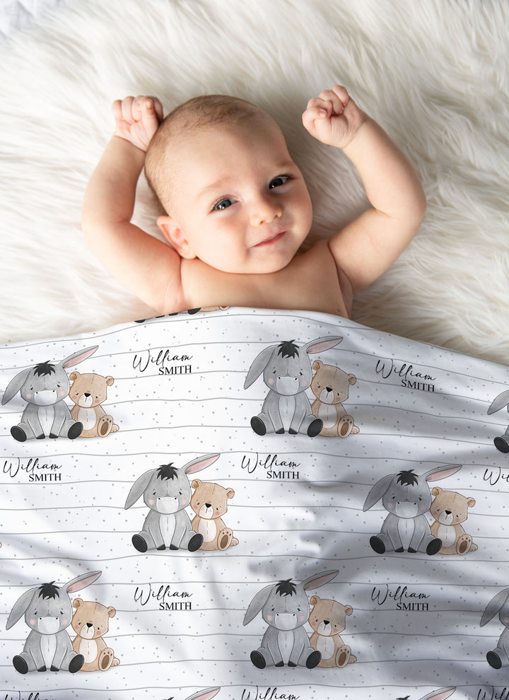 Custom baby swaddle blanket used as a pram cover for newborn outings