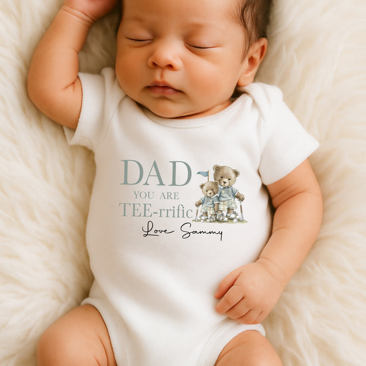 Cute Father's Day baby outfit with 'Tee-rific Daddy' message and golf graphic