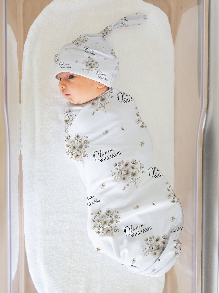 Personalised newborn beanie with custom name print, made from stretch poly fabric