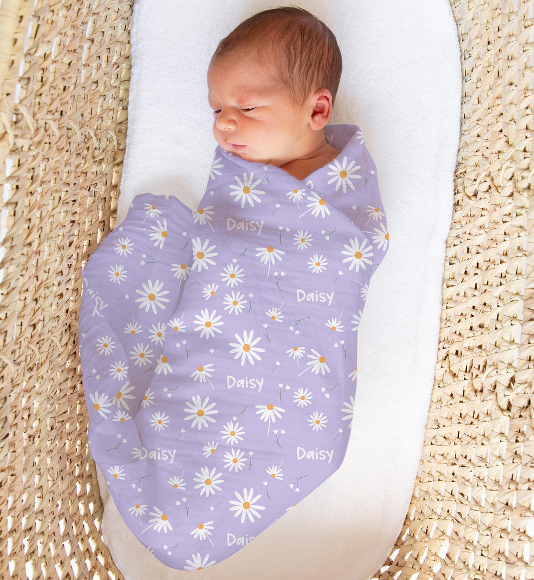 Personalised muslin swaddle wrap with baby’s name, soft breathable fabric, 120x120cm size for newborns and babies.