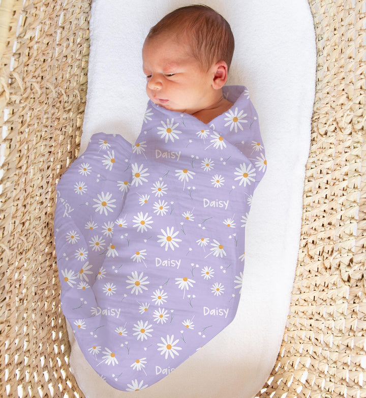 Personalised muslin swaddle wrap with baby’s name, soft breathable fabric, 120x120cm size for newborns and babies.