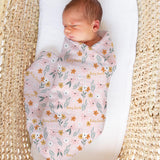Personalised muslin swaddle wrap with baby name, soft breathable fabric, 120x120cm for newborns.