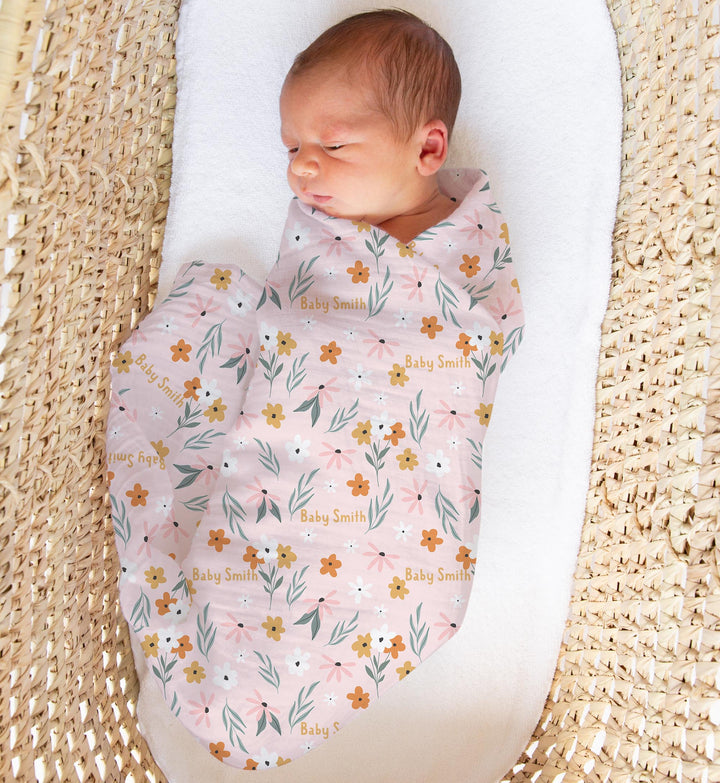 Personalised muslin swaddle wrap with baby name, soft breathable fabric, 120x120cm for newborns.