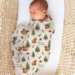 Custom muslin swaddle wrap personalized with baby’s name, soft breathable fabric, 120x120cm size for newborns.