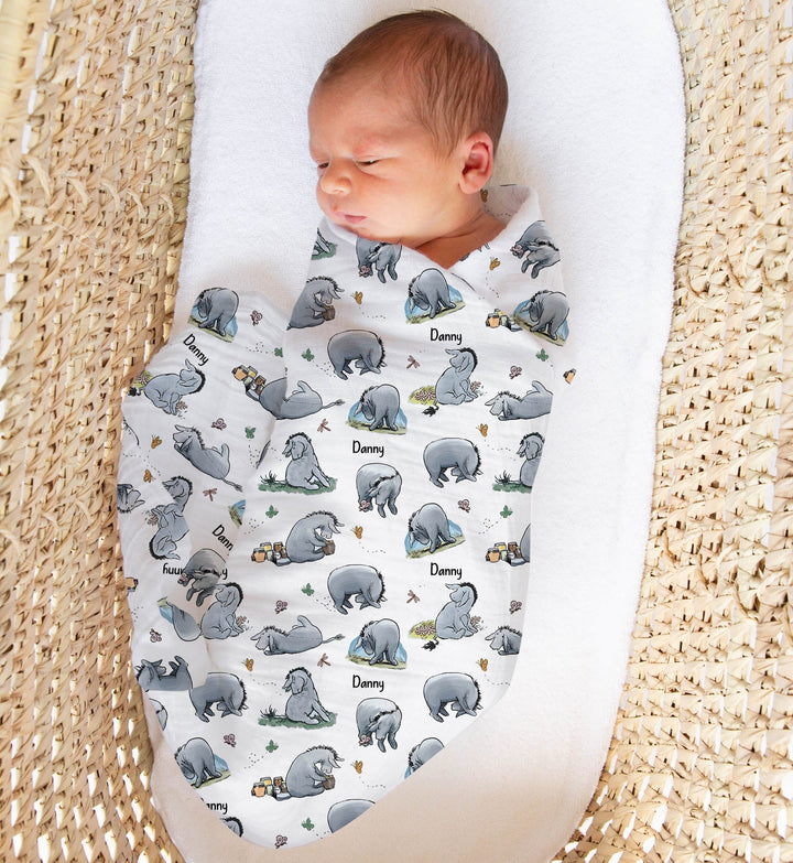 Personalised muslin swaddle wrap with baby name, soft breathable fabric, 120x120cm size for newborn comfort and gifting