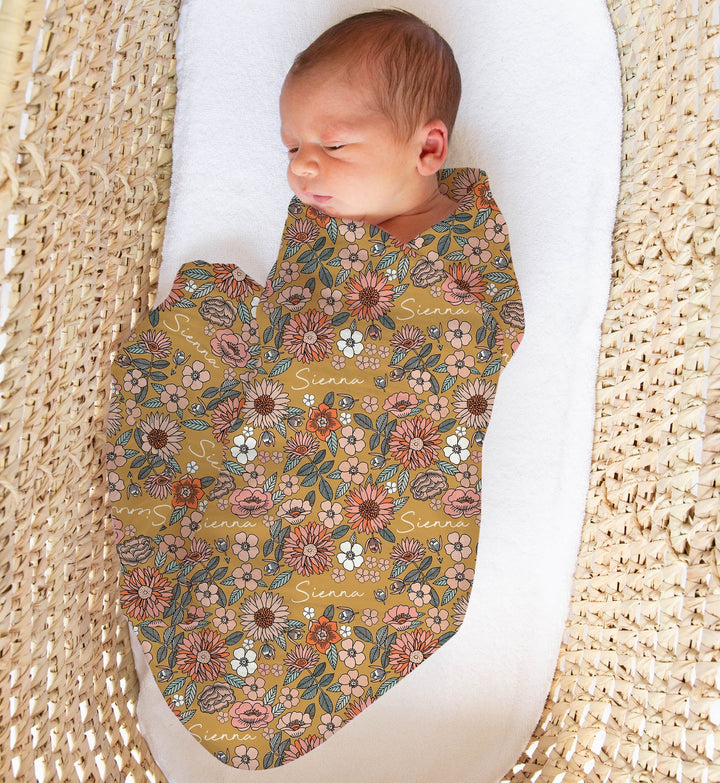 Personalised muslin swaddle wrap with baby’s name, soft breathable fabric, 120x120cm size for newborns.