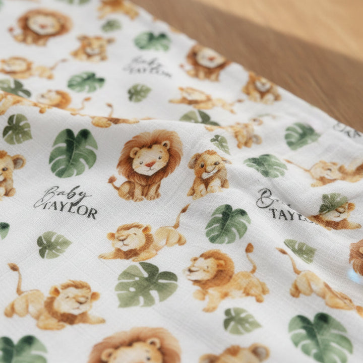 Custom muslin swaddle wrap personalized with baby’s name, soft breathable fabric, 120x120cm size for newborns and babies.