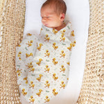 Personalised muslin swaddle wrap with baby name, soft breathable fabric, 120x120cm, ideal for newborn comfort and gifts
