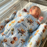 Personalised muslin swaddle wrap with baby name, soft breathable fabric, 120x120cm, perfect for newborn comfort and gifting