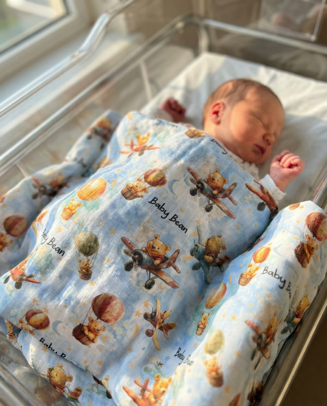 Personalised muslin swaddle wrap with baby name, soft breathable fabric, 120x120cm, perfect for newborn comfort and gifting