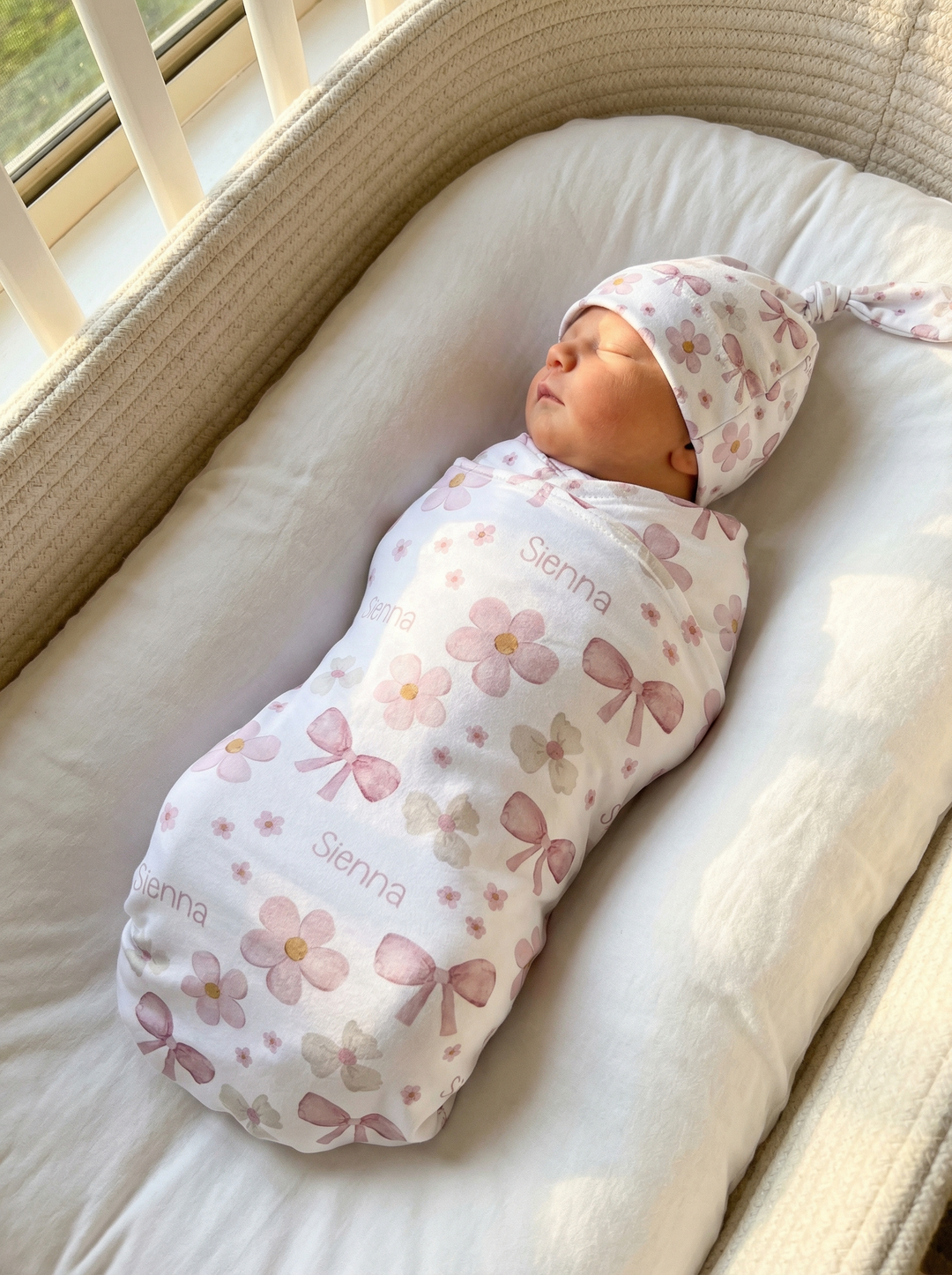 Personalised swaddle blanket and beanie set made from stretch poly fabric for newborn comfort and style