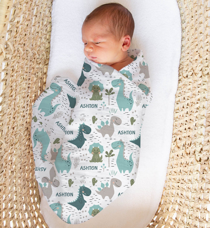 Personalised muslin swaddle wrap with baby name, soft breathable fabric, 120x120cm size for newborn comfort and gift