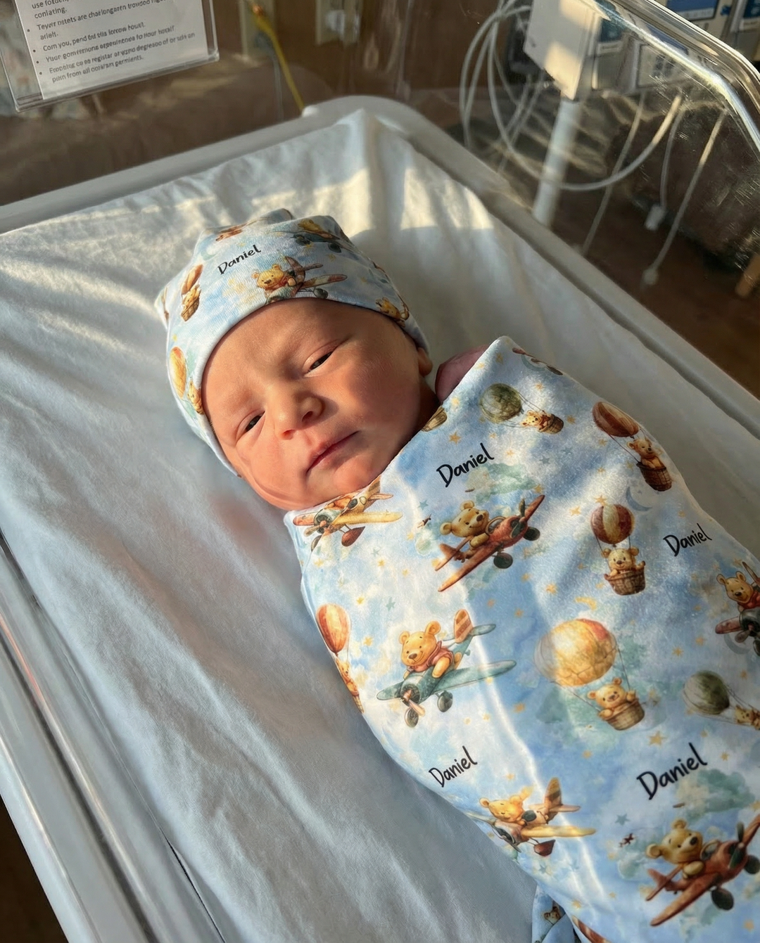 Personalised swaddle and beanie set made from soft stretch poly fabric for newborns