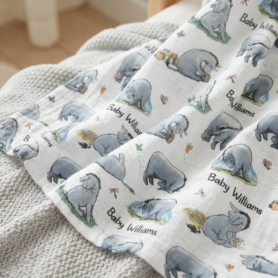 Personalised muslin swaddle wrap with baby name, soft breathable fabric, 120x120cm size, ideal for newborns and gifting
