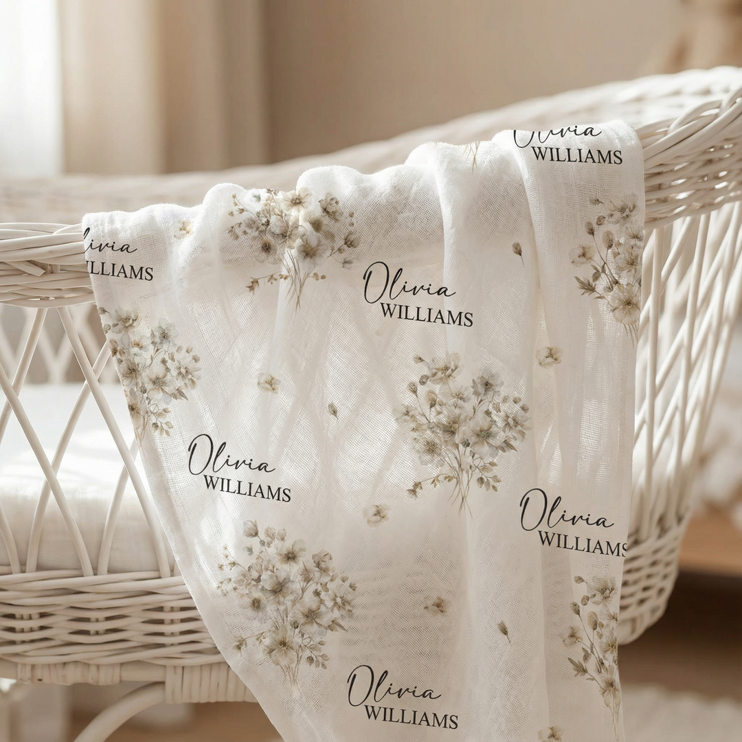 Custom muslin swaddle wrap personalized with baby’s name, soft breathable fabric, 120x120cm size for swaddling and cuddling.