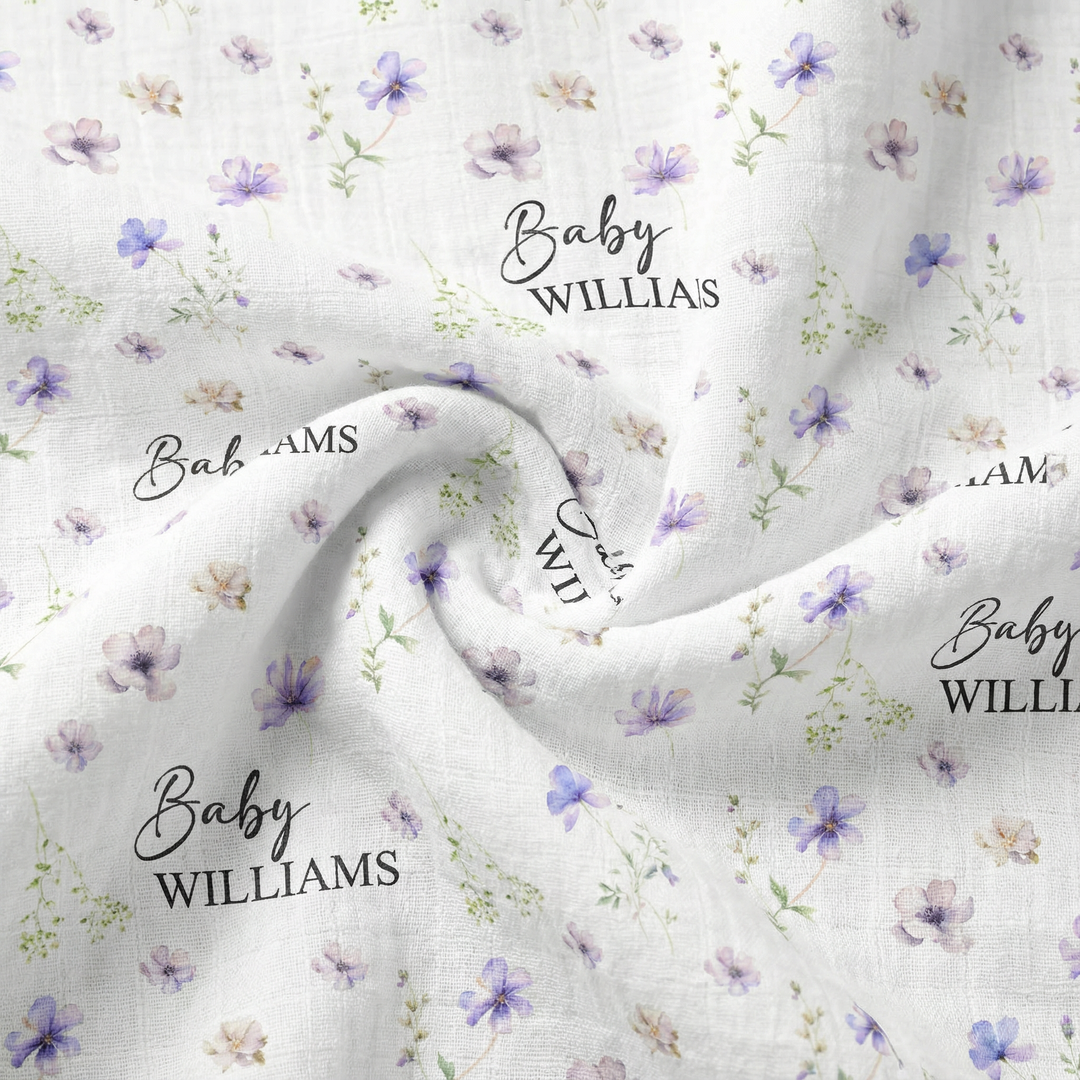 Custom muslin swaddle wrap personalized with baby’s name, soft breathable fabric, 120x120cm size for newborns.