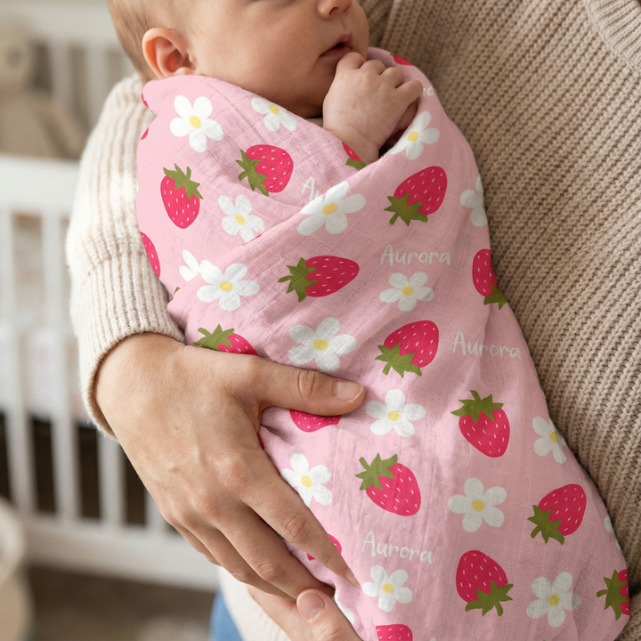 Personalised muslin swaddle wrap with baby name, soft breathable fabric, 120x120cm size for newborn comfort and versatile use