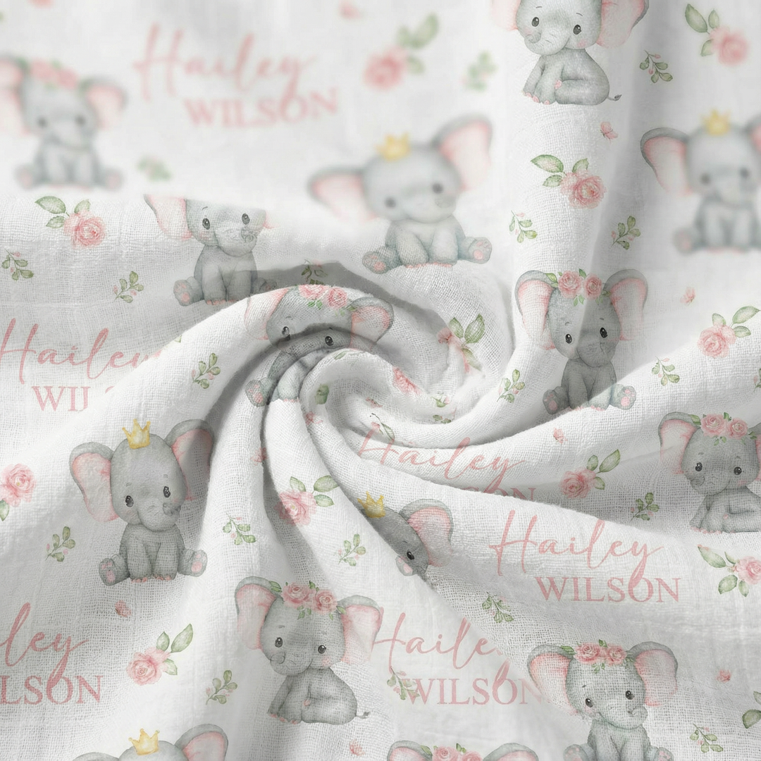Custom muslin swaddle wrap personalized with baby's name, soft breathable fabric, 120x120cm size for newborns.