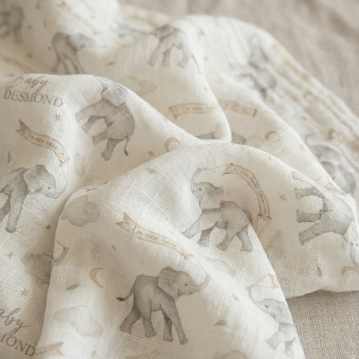 Custom muslin swaddle wrap personalized with baby name, soft breathable fabric, 120x120cm size for newborns and babies