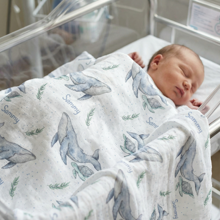 Personalised muslin swaddle wrap with baby name, soft breathable fabric, 120x120cm size for newborns