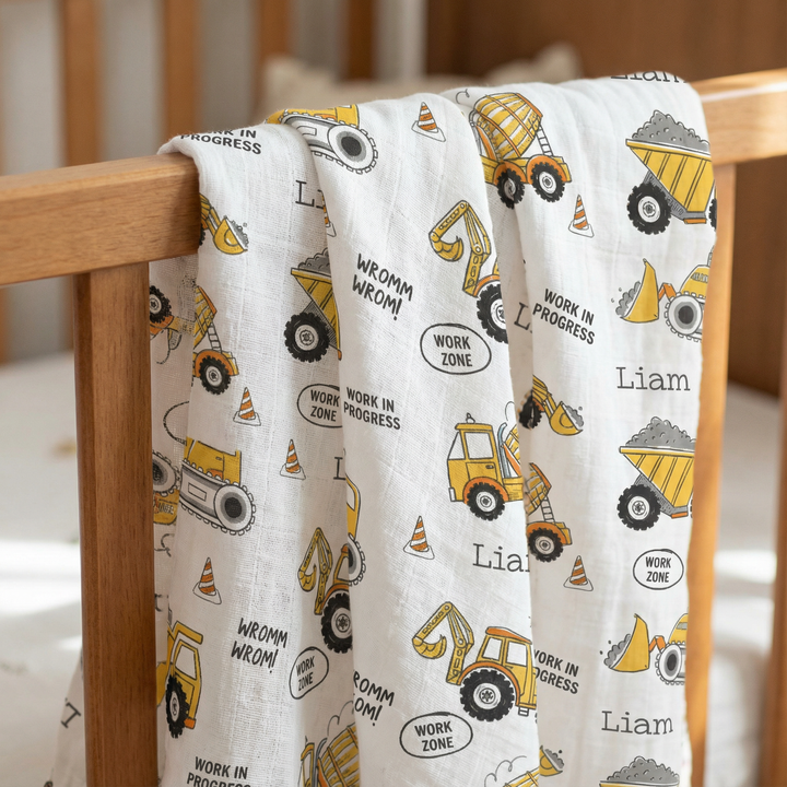 Personalised muslin swaddle wrap with baby name, soft breathable fabric, 120x120cm for newborns.