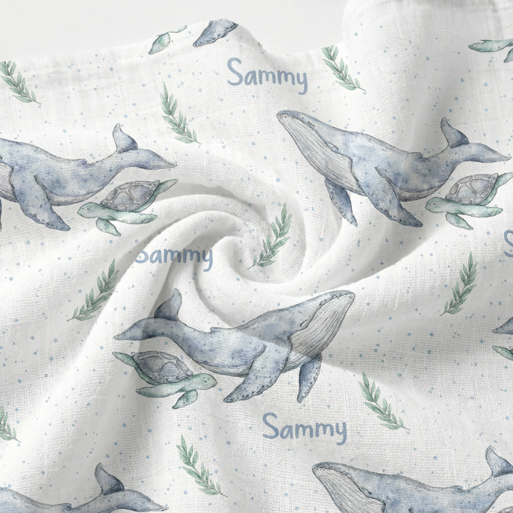 Personalised muslin swaddle wrap with baby name, soft breathable fabric, 120x120cm size, ideal for newborns and gifting