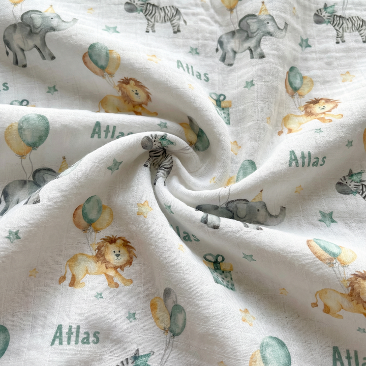 Personalised muslin swaddle wrap with baby name, soft breathable fabric, 120x120cm size for newborns.