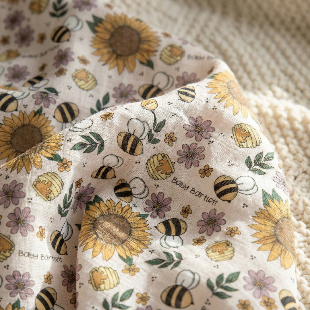 Personalised muslin swaddle wrap with baby name, soft breathable fabric, 120x120cm, suitable for newborns.