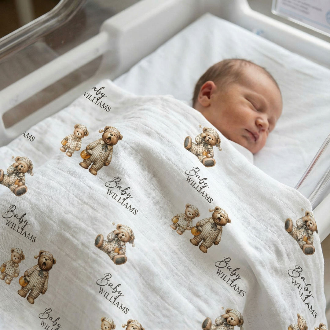 Custom muslin swaddle wrap personalized with baby’s name, made from soft breathable muslin, sized 120x120cm for newborn comfort and versatility.