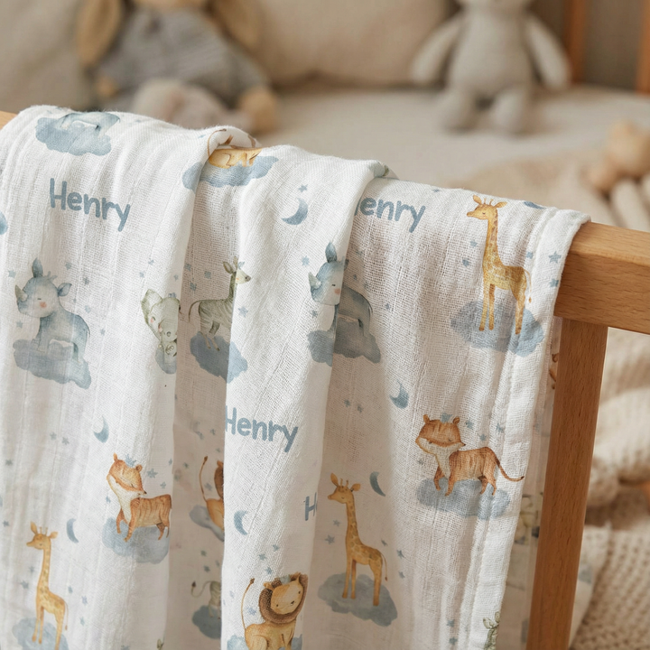 Personalised muslin swaddle wrap with baby name, soft breathable fabric, 120x120cm size, ideal for newborns and babies.