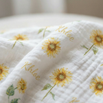 Personalised muslin swaddle wrap with baby name, soft breathable fabric, 120x120cm size for newborns and babies.
