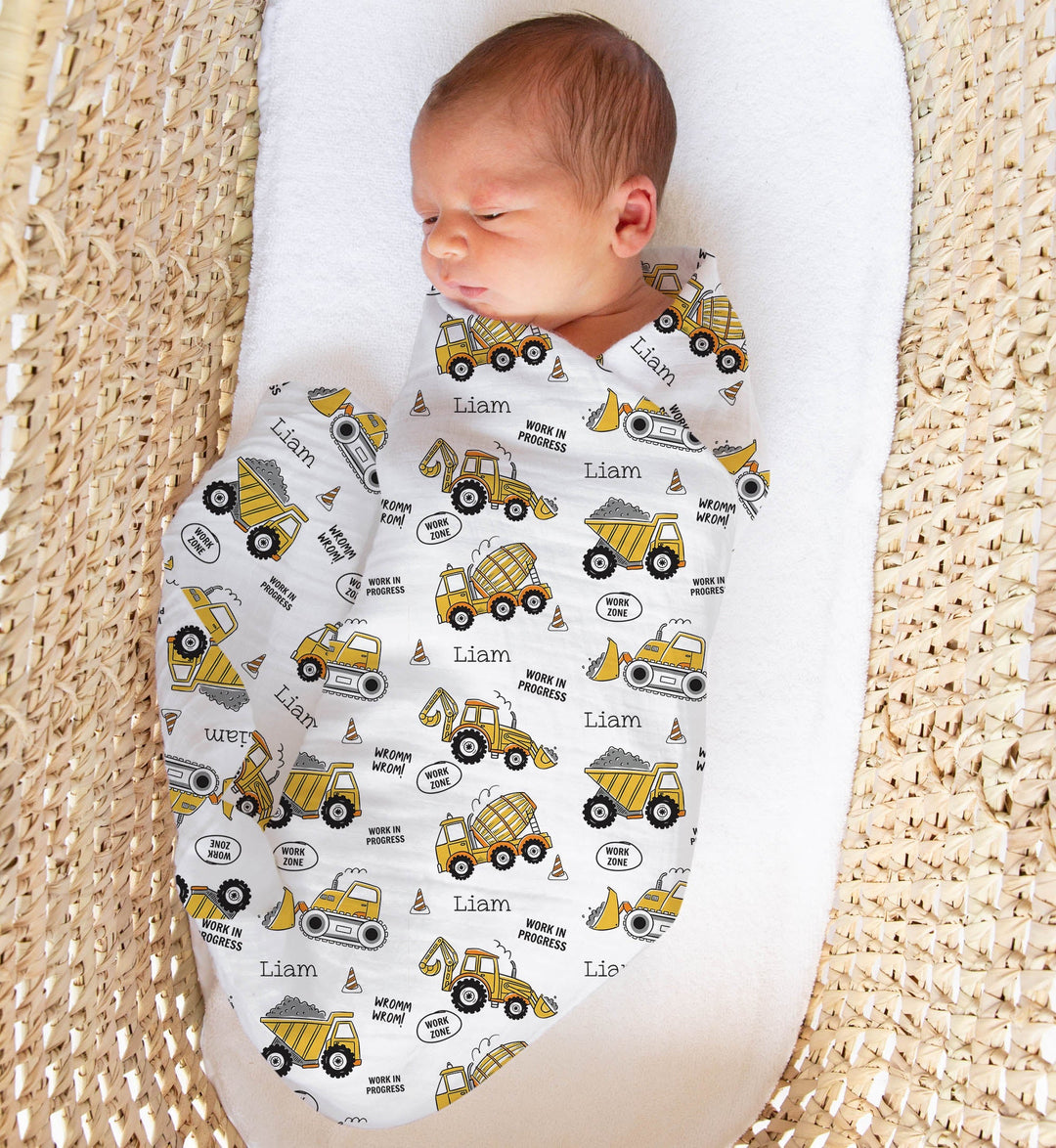 Personalised muslin swaddle wrap with baby name, soft breathable fabric, 120x120cm, ideal for newborns and gifting