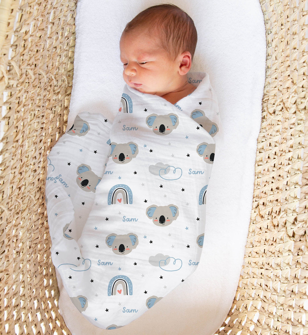 Personalised muslin swaddle wrap with baby name, soft breathable fabric, 120x120cm, ideal for newborn comfort and gifting