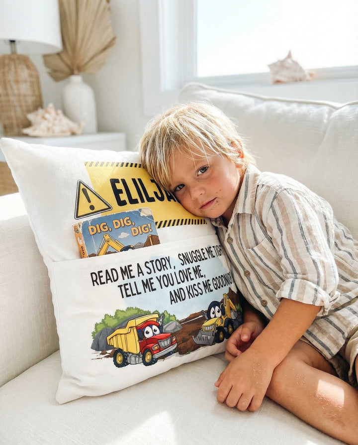 Personalised Construction Pocket Book Cushion with trucks and diggers illustration and built-in book pocket for boys