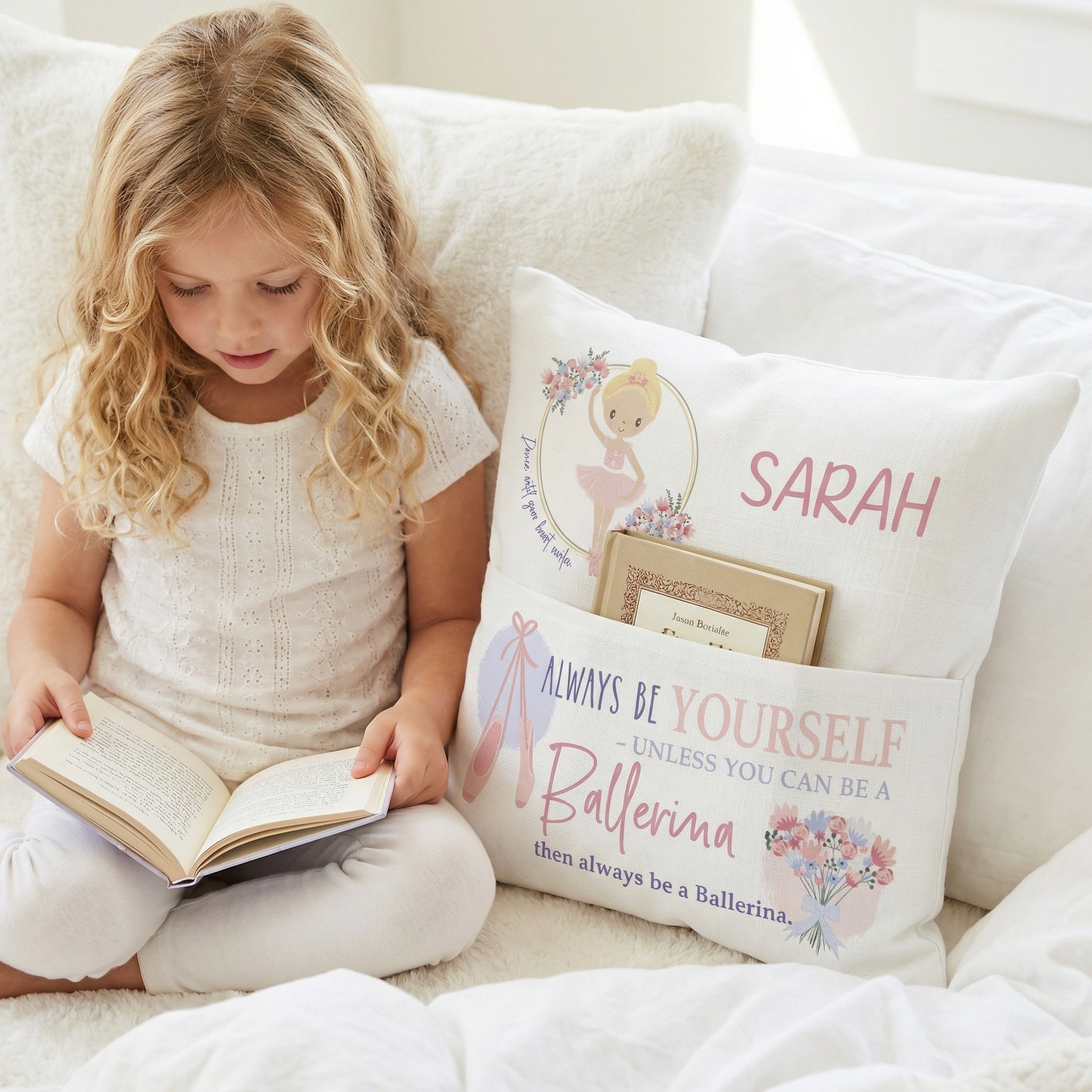 Personalised ballerina pocket book cushion with child’s name and built-in book pocket in pastel tones