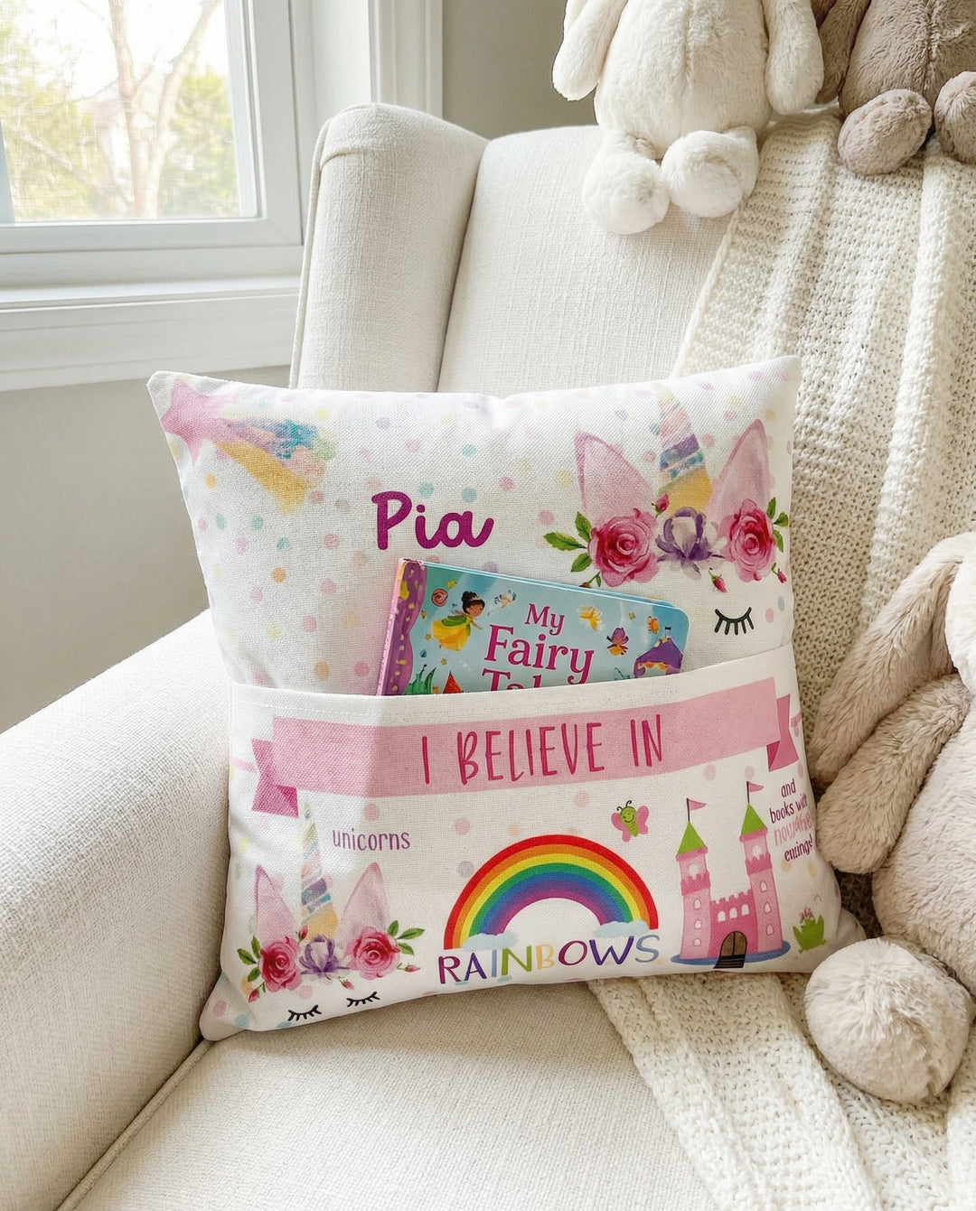 Personalised unicorn pocket book cushion with pastel unicorn design and name, featuring built-in book pocket for kids.