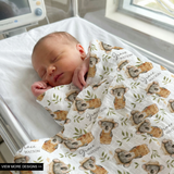 Custom muslin swaddle wrap personalized with baby’s name, breathable soft fabric, 120x120cm size for newborns and babies.