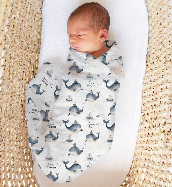 Custom muslin swaddle wrap personalized with baby name, soft breathable fabric, 120x120cm size for newborns.