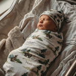 Personalised baby swaddle and beanie set in soft stretch poly fabric for newborn comfort and style
